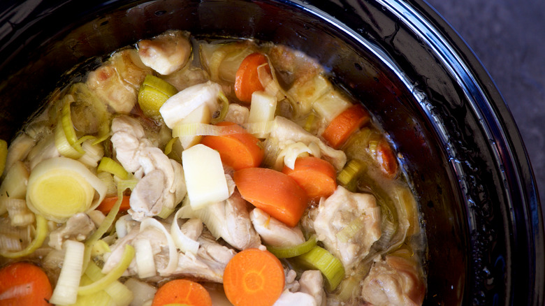 Chicken and vegetable soup cooking