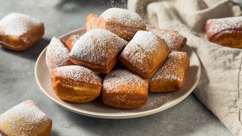 Beignets on a white plate