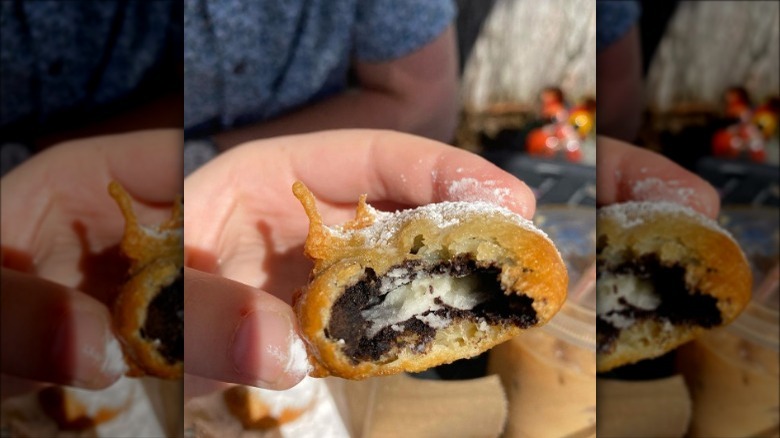 a bitten into oreo stuffed beignet