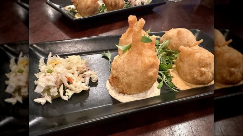 crab beignets on plate