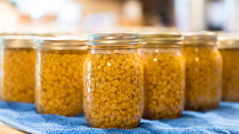 Glass jars of corn