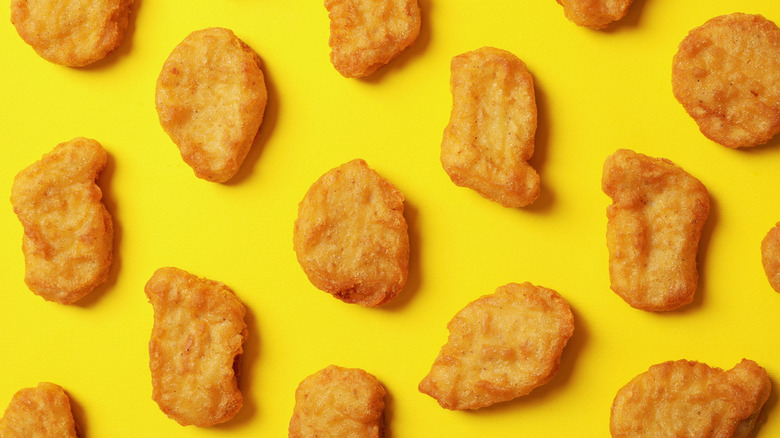 Chicken nuggets on yellow background