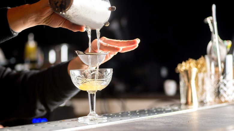 Pouring a cocktail