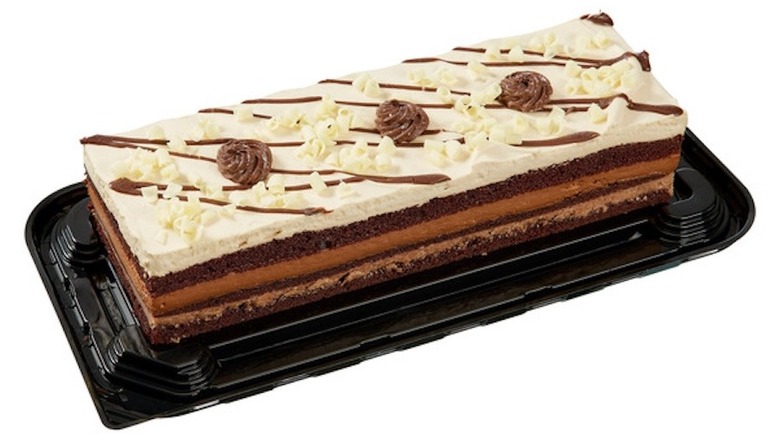 Mocha crunch bar cake on white background