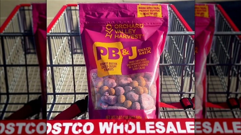 Orchard Valley Harvest PB&J Snack Mix with peanut butter coated peanuts and jam-coated, dried fruit