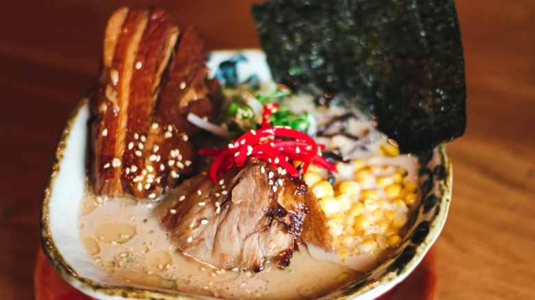 Ramen bowl with corn, pork, and seaweed