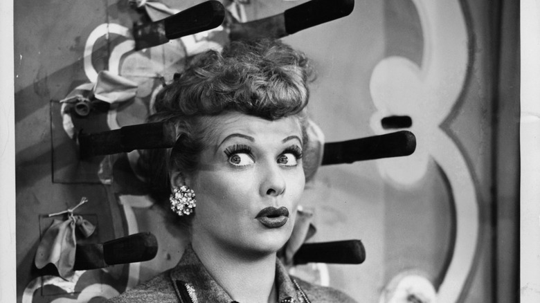 A black and white photo of Lucille Ball looking surprised