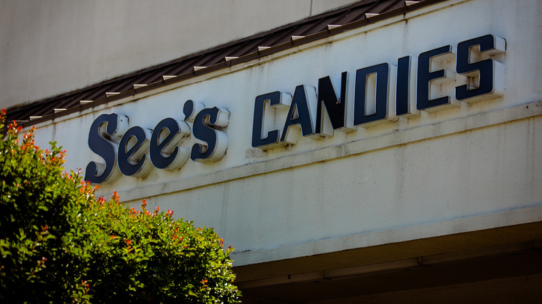The exterior signage of a See's Candies location in Los Angeles