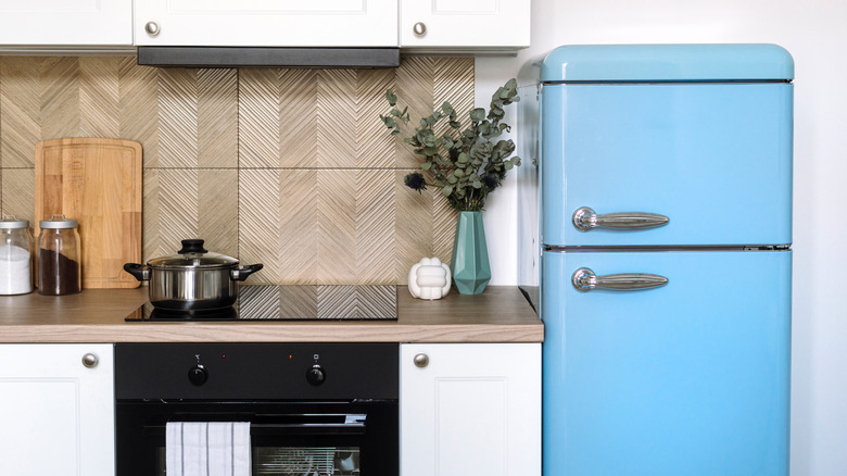 Kitchen with powder blue vintage fridge