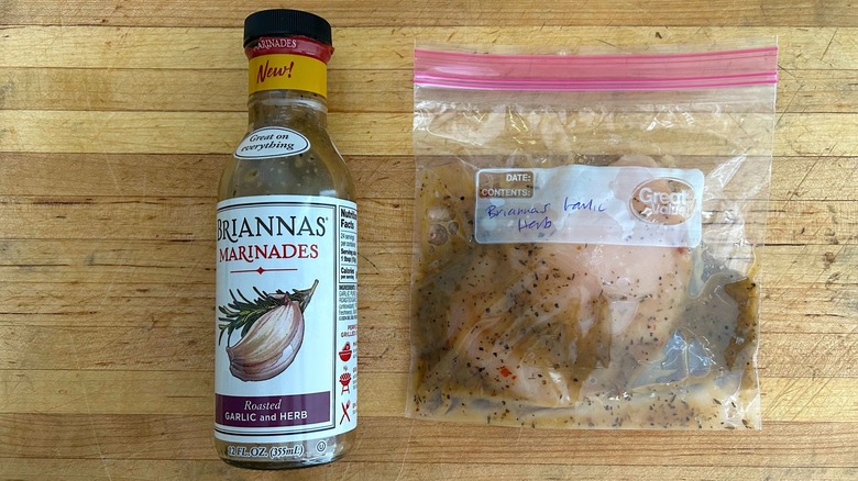 Briannas Marinades Garlic and Herb with bag of marinating chicken