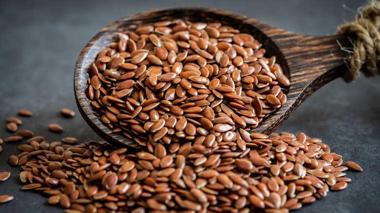 Flax seeds in a wooden spoon