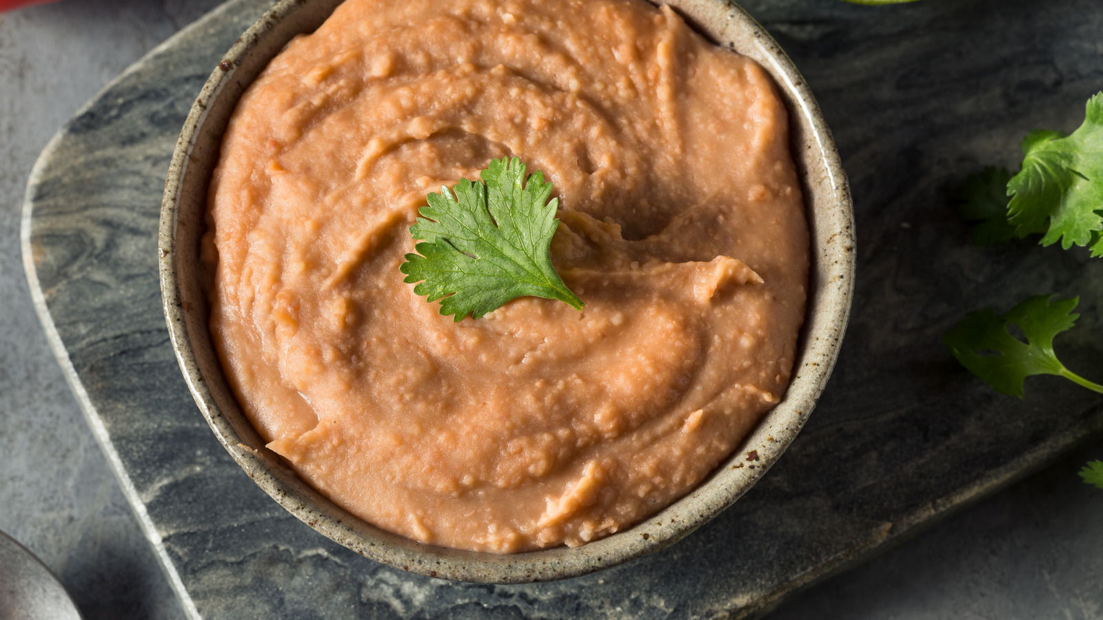 The 2 Simple Ingredients That Easily Upgrade Canned Refried Beans