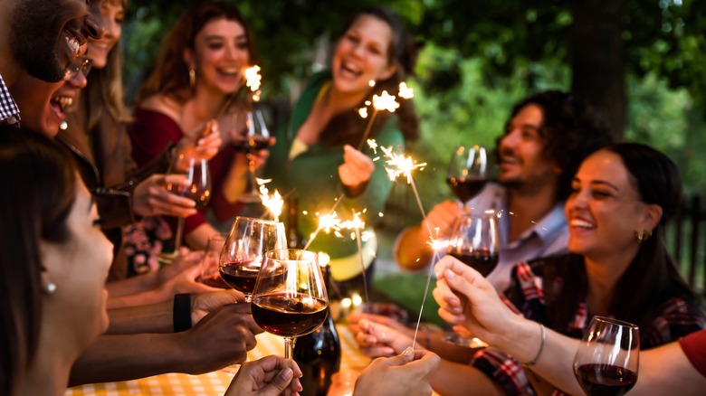 Nine friends at a dinner party