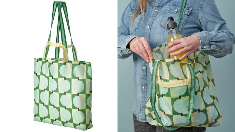 Yellow, blue, and green patterned tote bag with pencils and notebook on a table