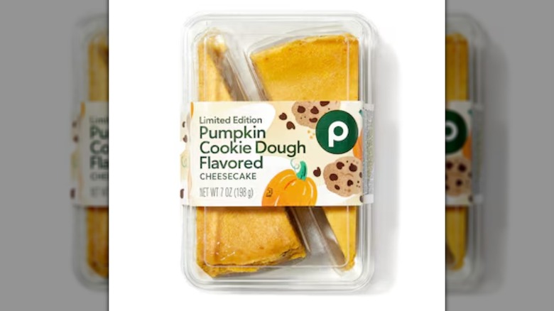 Two slices of packaged Publix Cookie Dough Pumpkin Cheesecake on a white background