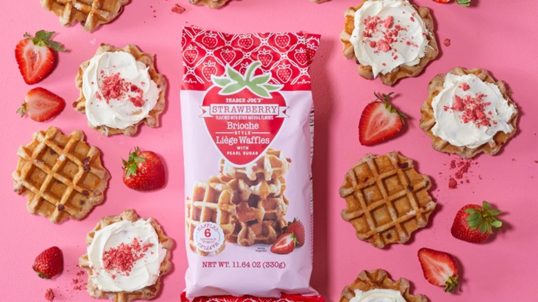 Package of Strawberry Brioche Style Liège Waffles with waffles and strawberries around it