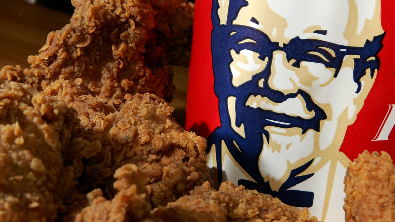 A KFC bucket with Extra Crispy chicken.
