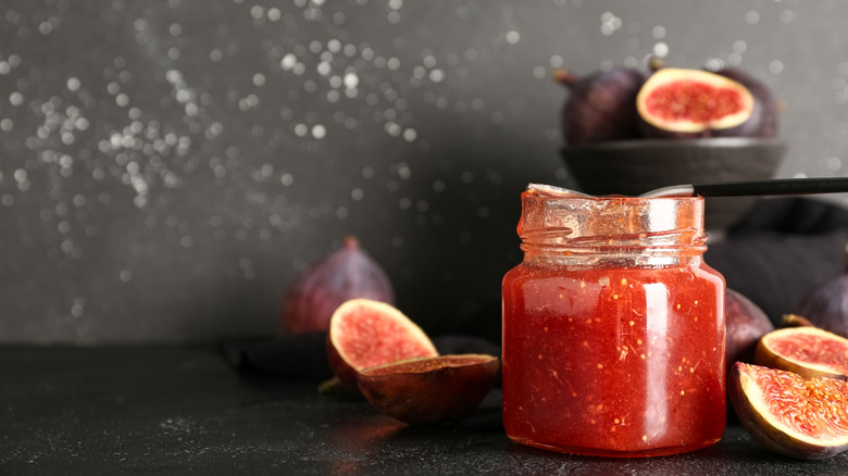 Jar of fig jam and fresh figs