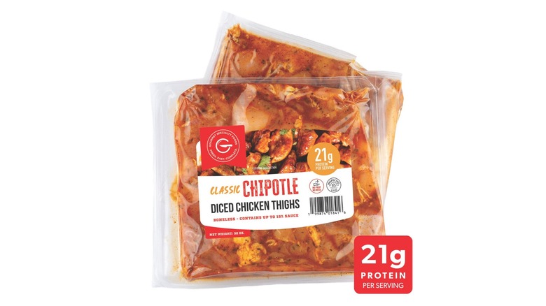 A package of Chipotle Seasoned Diced Chicken Thighs at Sam's Club against a white background.