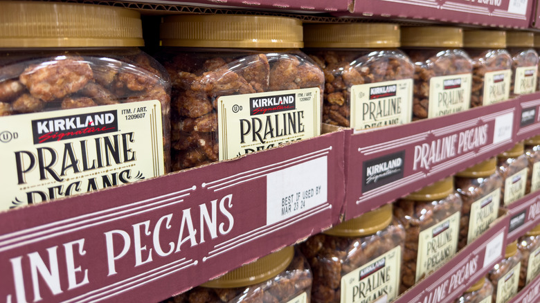 Conatiners of Kirkland praline pecans on display at Costco