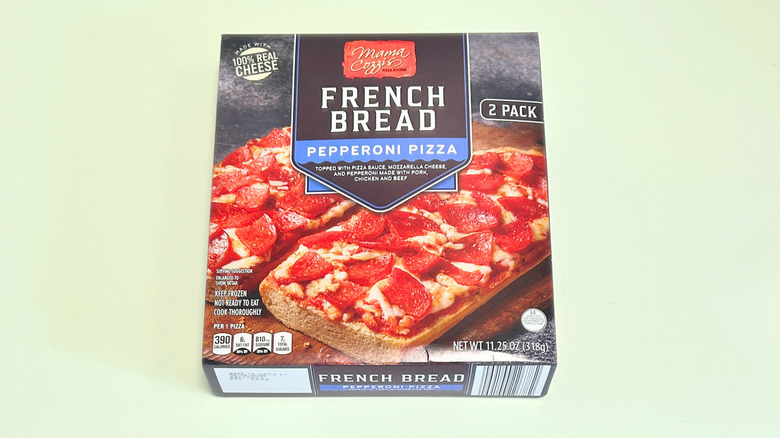 A box of Mama Cozzi French Bread Pepperoni Pizza isolated on a light green background