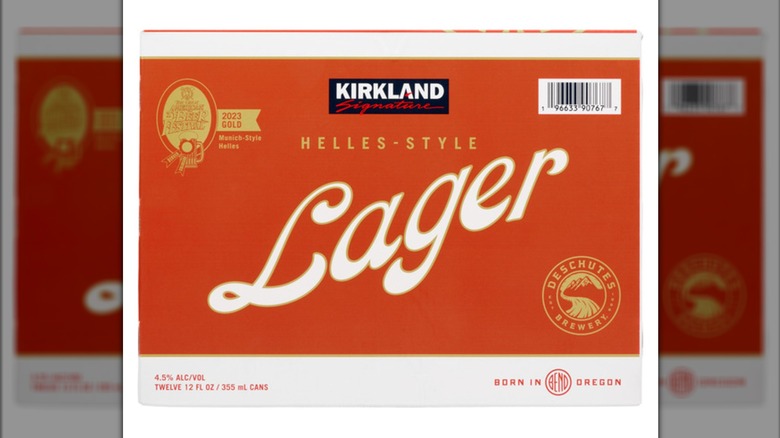 A reddish-orange and white 12 pack of Kirkland Signature Helles-Style Lager cans