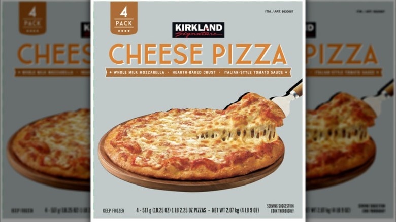 a box of Kirkland Signature four cheese pizza