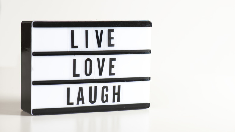 A lightbox with the phrase "Live, Love, Laugh" printed on it