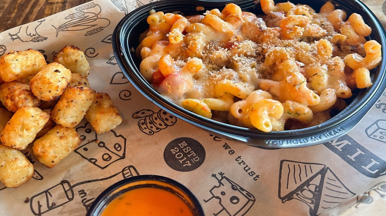 Close-up on a heart-shaped bowl of I Heart Mac and Cheese
