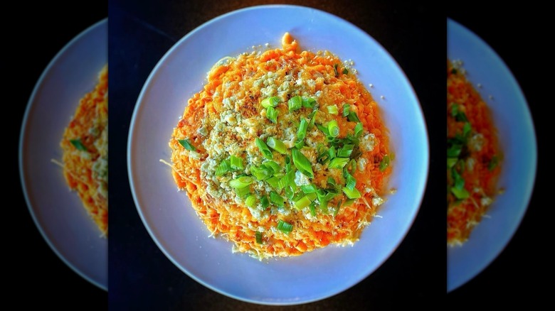 Overhead view of a plate of Kuma's Corner buffalo chicken mac