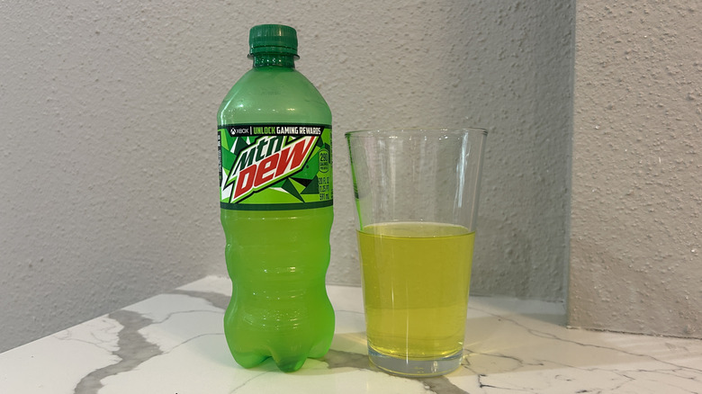 Original Mountain Dew in bottle and cup