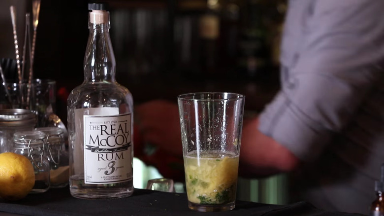 A bottle of Real McCoy 3 being used