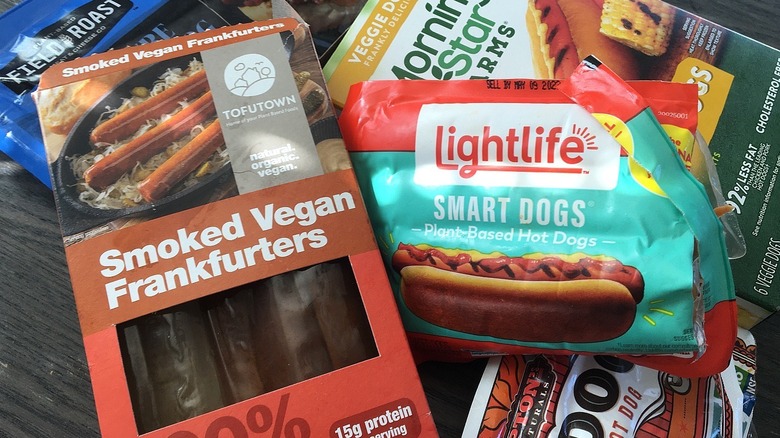 Variety of vegan hot dog brands in packaging