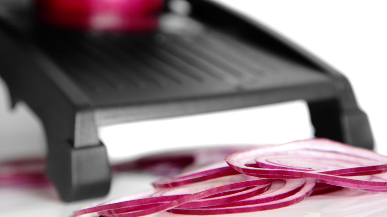 Red onions slices with mandoline