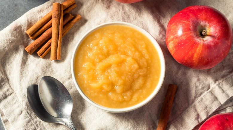 Bowl of applesauce with spoons