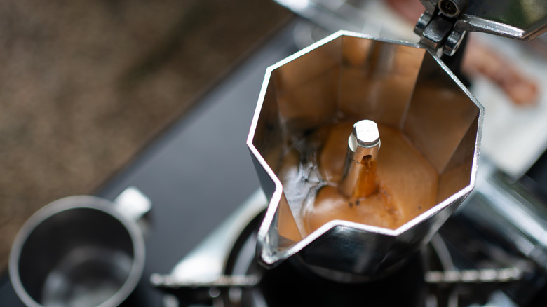 top down of an open moka pot brewing