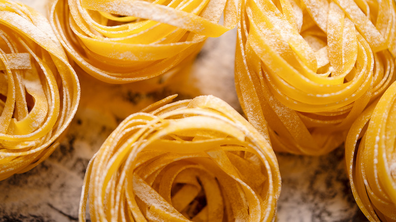 pasta noodles freshly made and swirled into circles