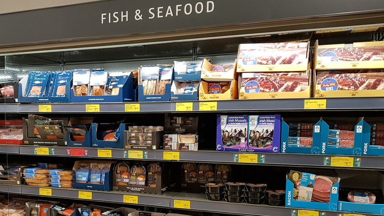 Seafood stocking Aldi's refrigerated shelves