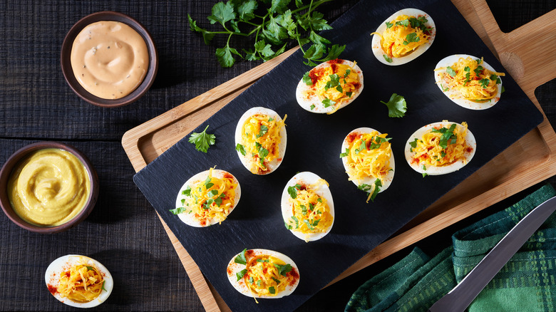 Deviled eggs with sauces