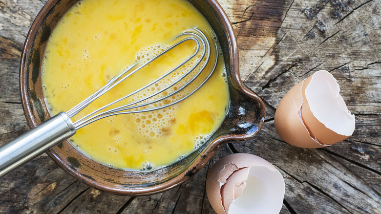 Whisked eggs in a bowl