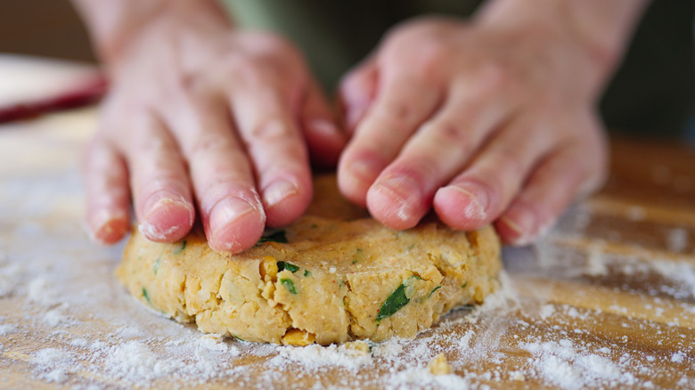 hands shaping a veggie patty