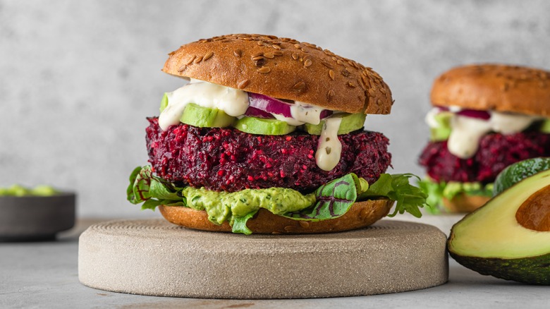 beet veggie burger with greens