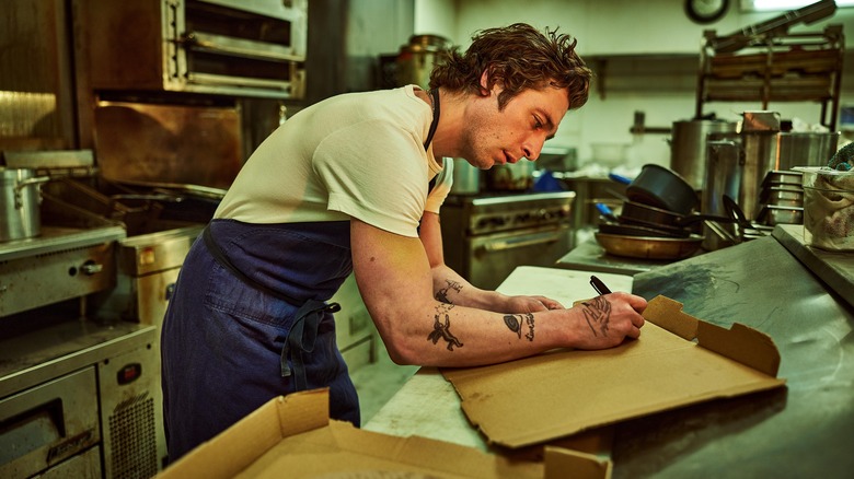 Carmy from FX's The Bear in the restaurant kitchen