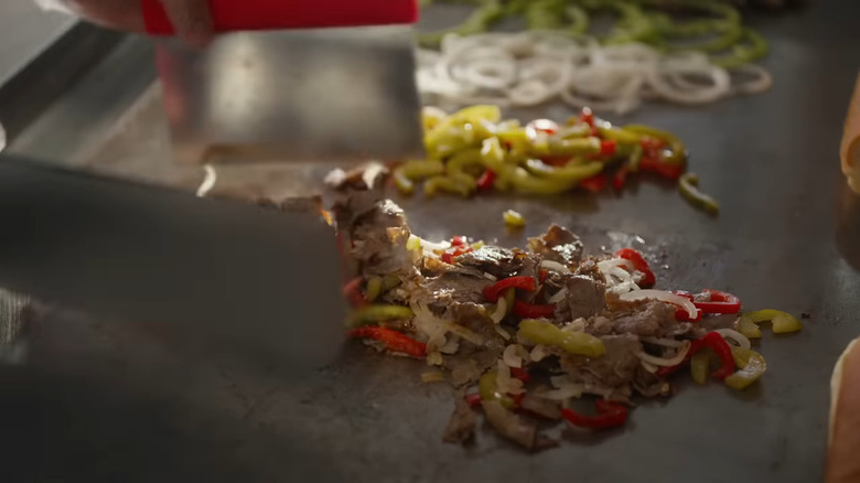 Jersey Mike's cheese steak and veggies on grill