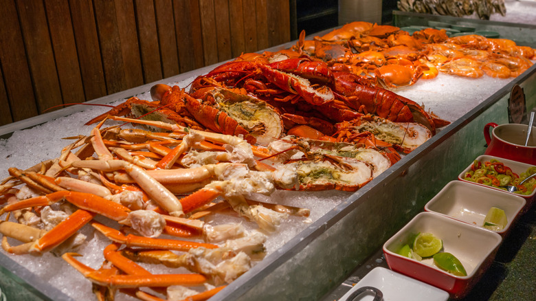 A buffet of fresh crab legs, lobsters, and crab