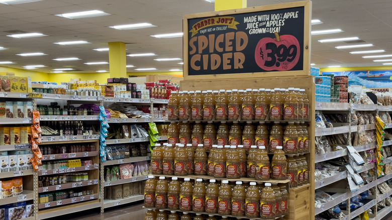 Shelves filled with spiced cider at a Trader Joe's