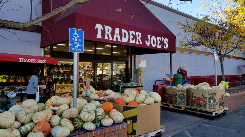 Trader Joe's storefront with pumpkins and decorations outside