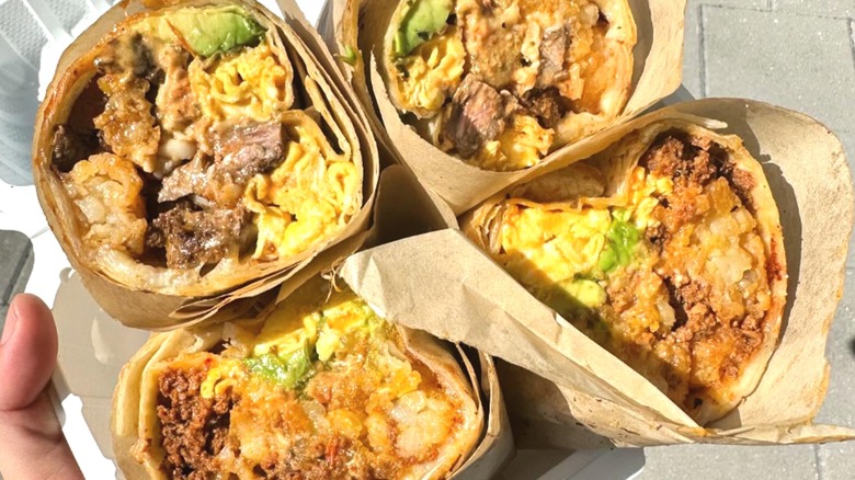 Two breakfast burritos cut in half