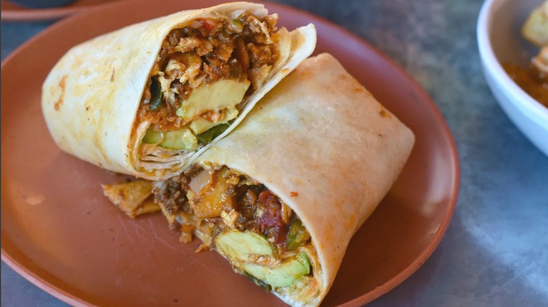 Breakfast burrito cut in half