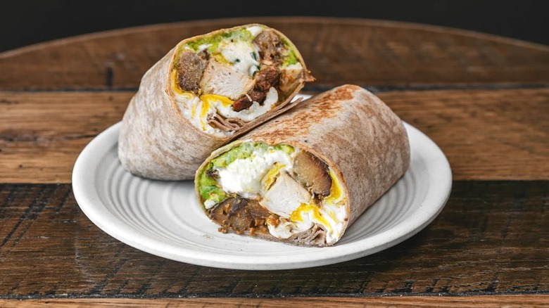 Breakfast burrito from Pressed Cafe cut in half